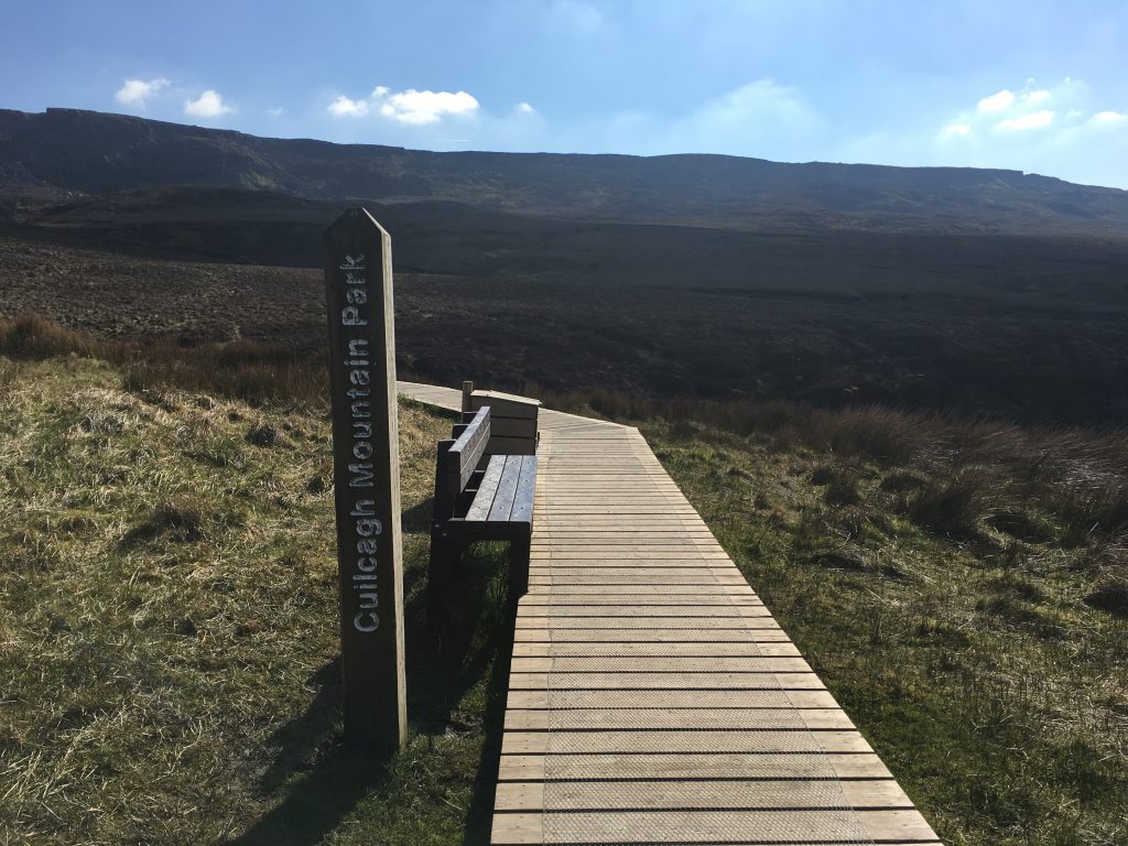 A picture of the beginning of the boardwalk at the Stairway to Heaven Ireland
