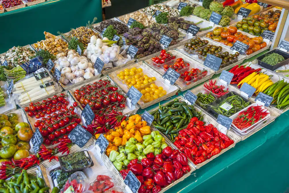 fresh vegetables and fruits offered at the victualien market in